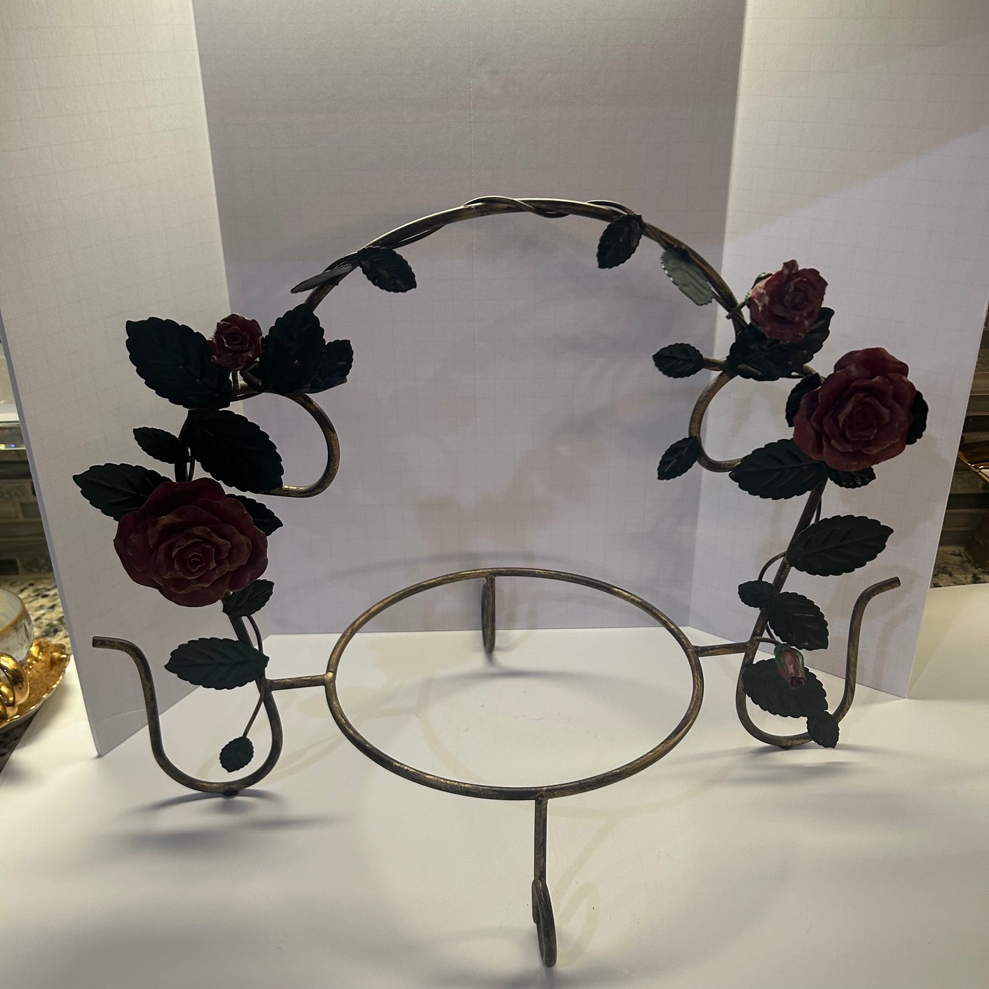 Rustic metal plate holder with red rose and green leaf design