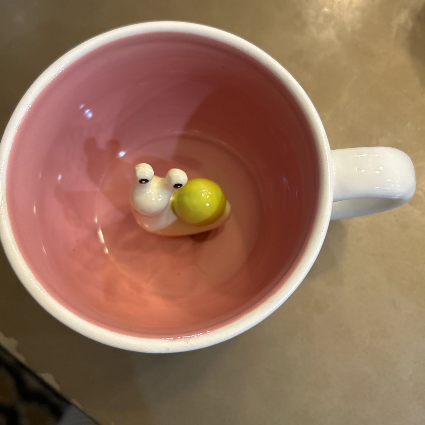 White Mug w/ Flower Design & Snail Center Piece