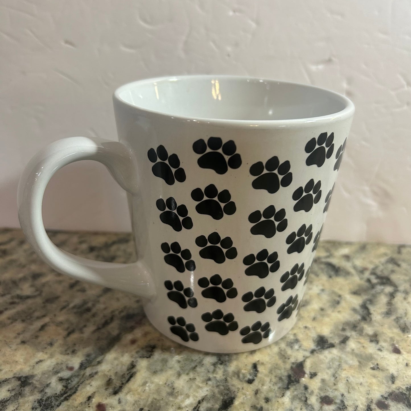 “My Dog Better Than Yours” White Mug With Black Paw Prints