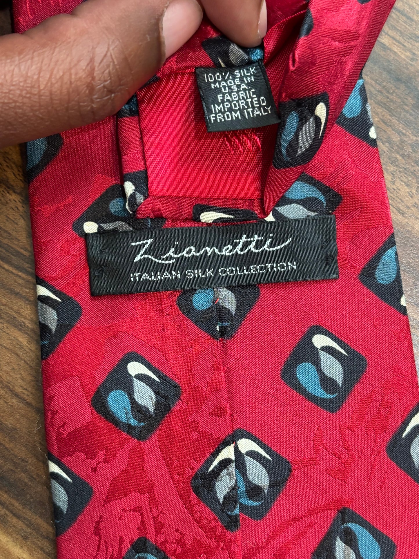 Lionetti Red Tie w/ geometric Designs 58” 100% Silk