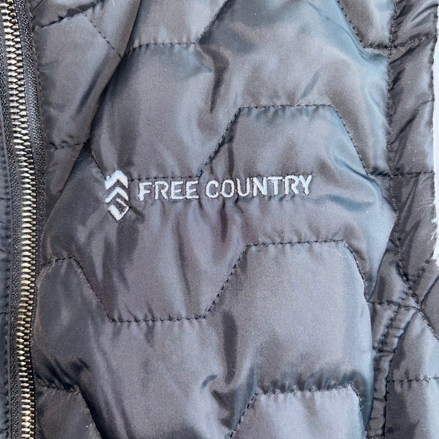 Free country women’s puffer vest, reversible size medium charcoal, gray 
