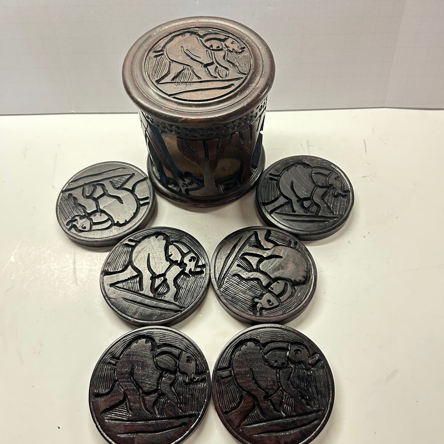 Hand Craved Elephant Coasters in Carved Holder (Dark Wood)