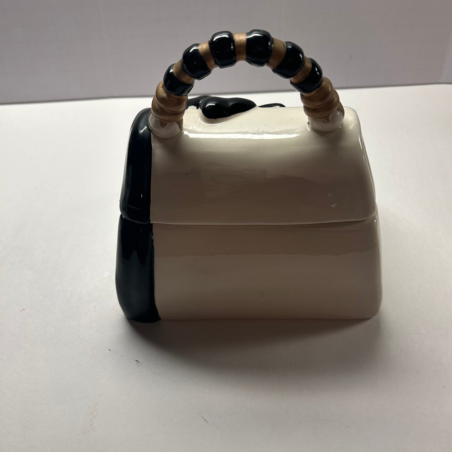 White Black and Gold Ceramic Cookie Jar Purse with Flower Design