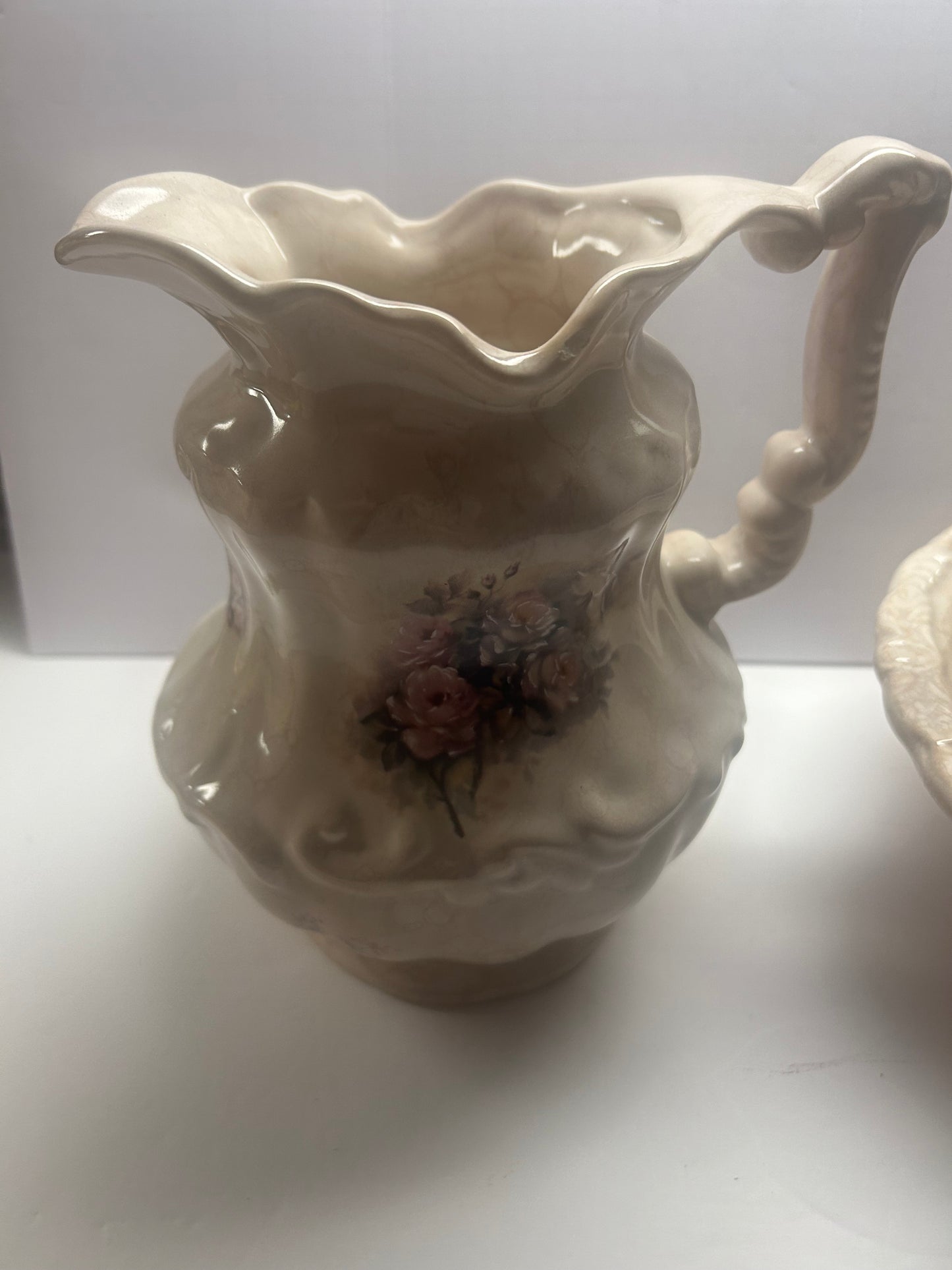 Vintage ceramic and crackle with floral design patterned Pitcher and bowl set