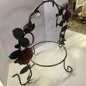 Rustic metal plate holder with red rose and green leaf design