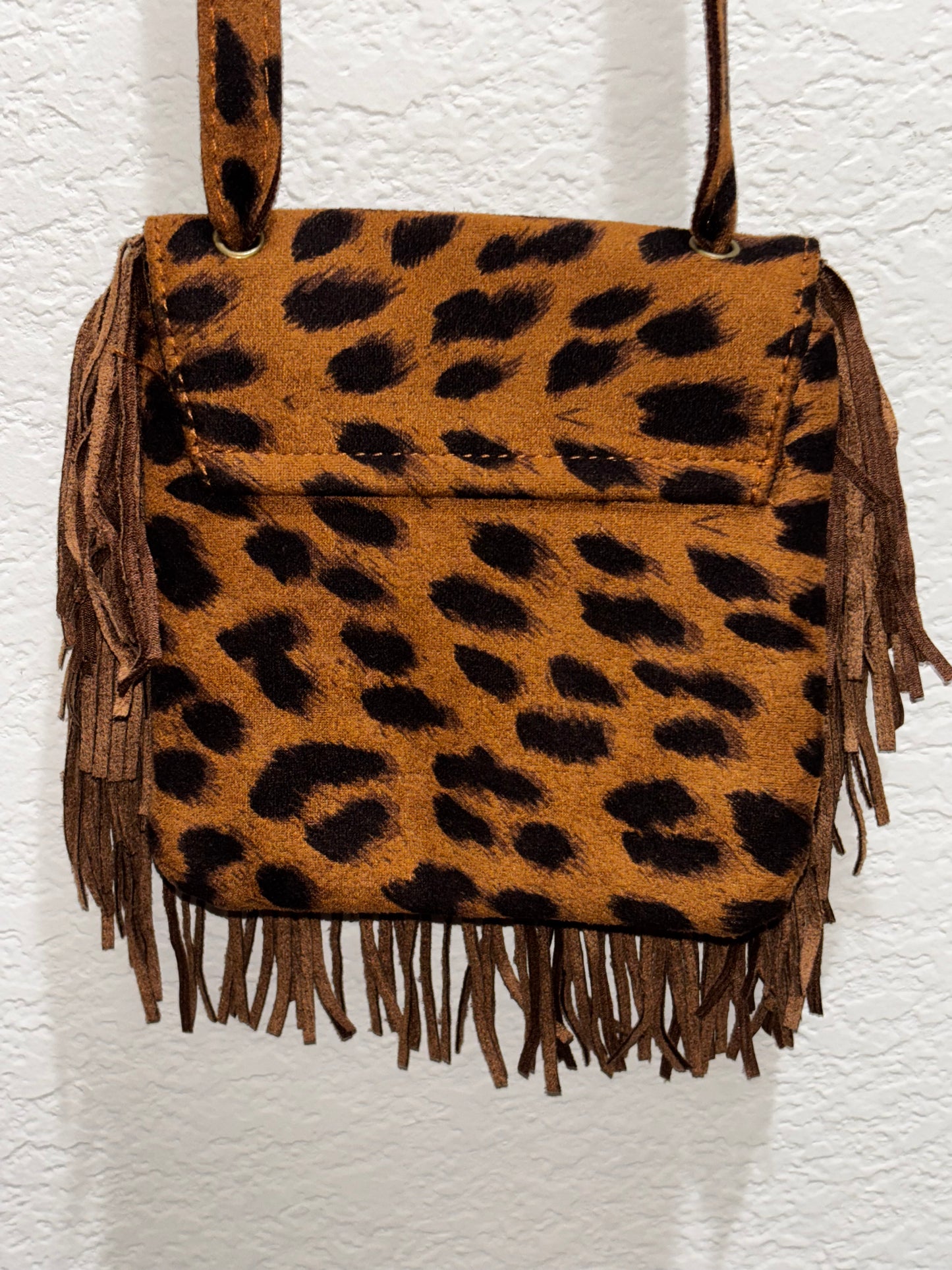 Women’s leopard fringe mini cross bag