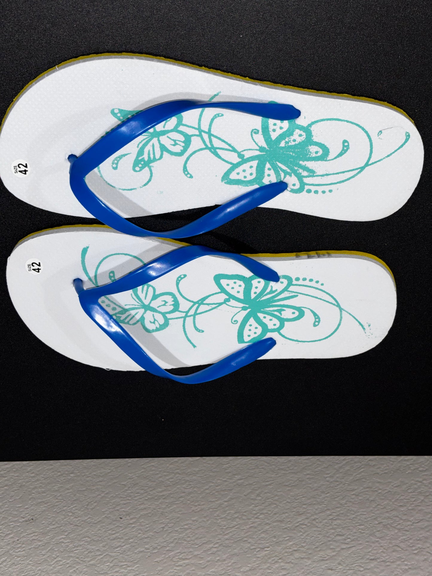 White Blue Flip Flops with Butterfly design size 42. (10/10.5)