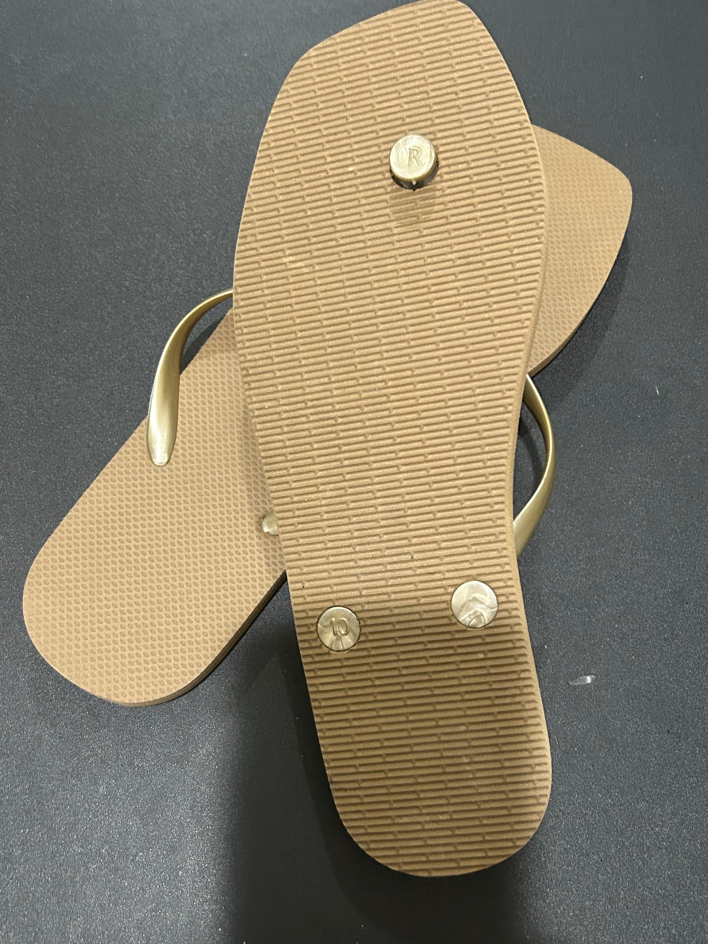 Tan and Gold Women’s flip-flops size 10