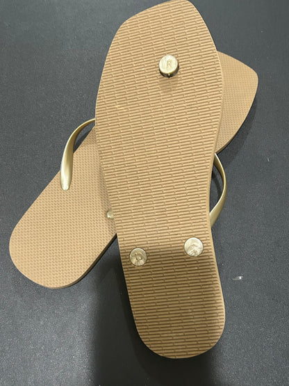 Tan and Gold Women’s flip-flops size 10