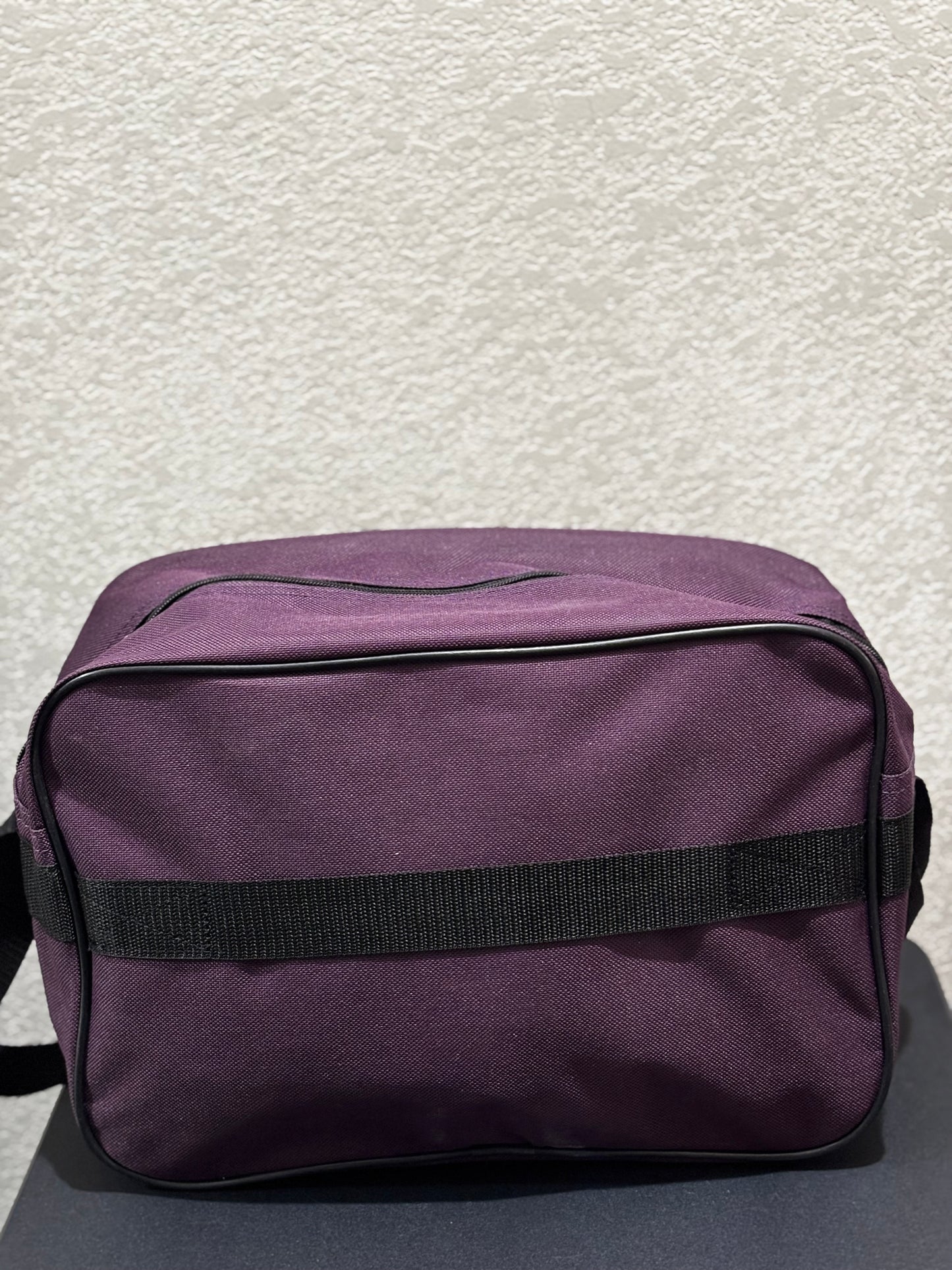 American Tourister Purple Carry-on Travel bag