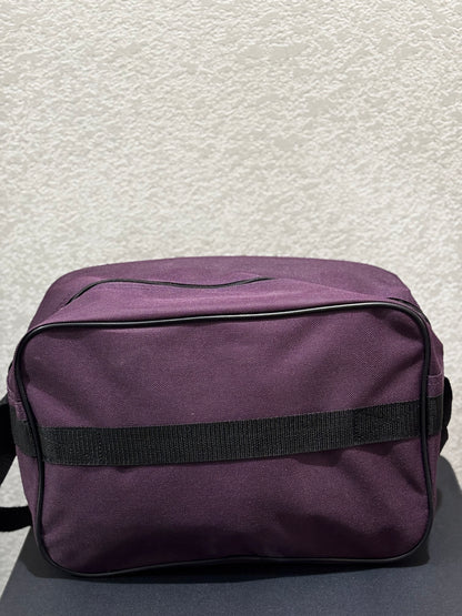 American Tourister Purple Carry-on Travel bag