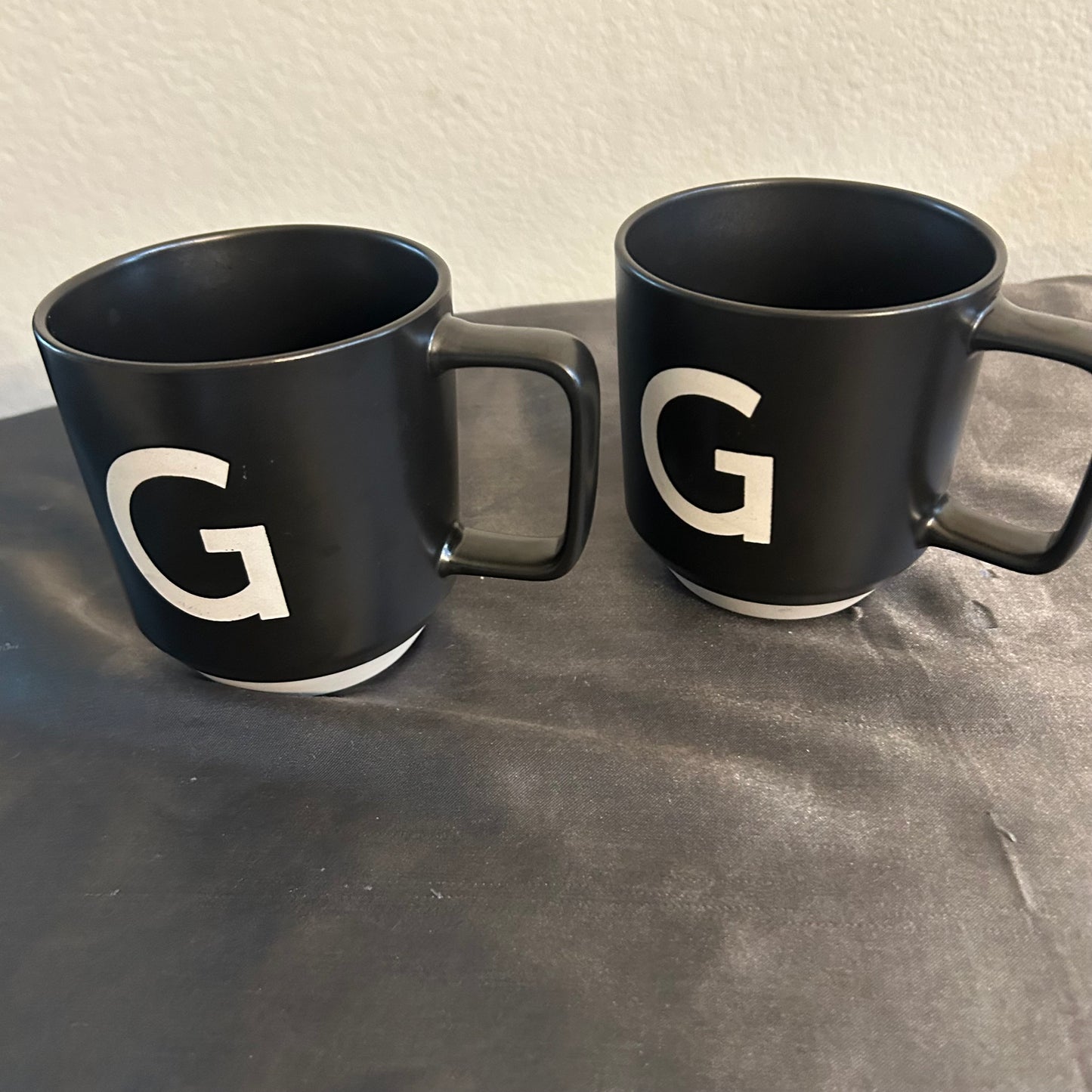 Mugs Black w/  monogram “G” in white set of 2