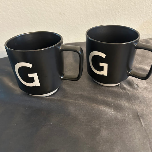 Mugs Black w/  monogram “G” in white set of 2