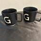 Mugs Black w/  monogram “G” in white set of 2