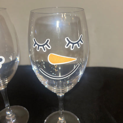 Snowman wine glasses (set up 2)9 inches tall￼