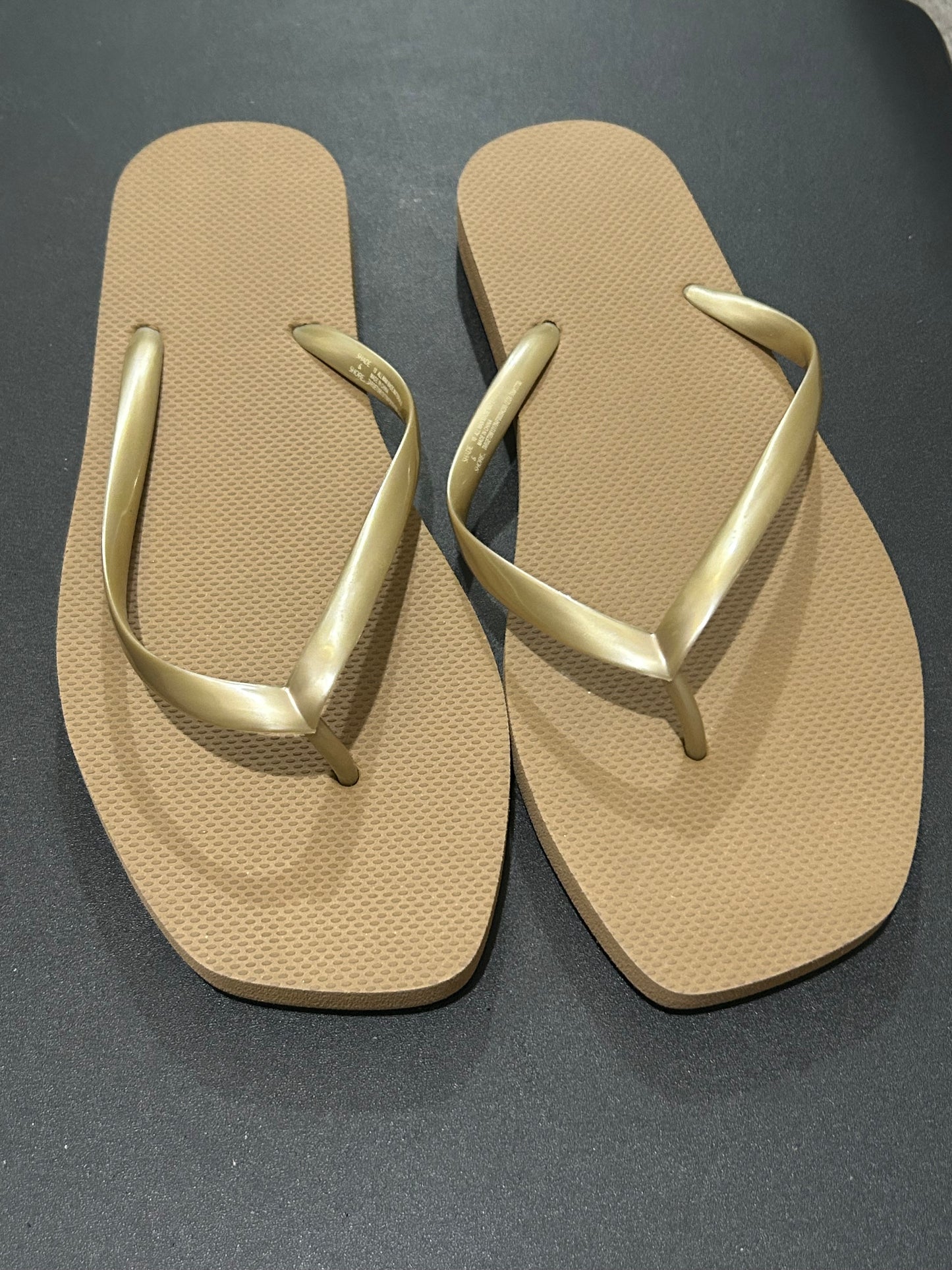 Tan and Gold Women’s flip-flops size 10
