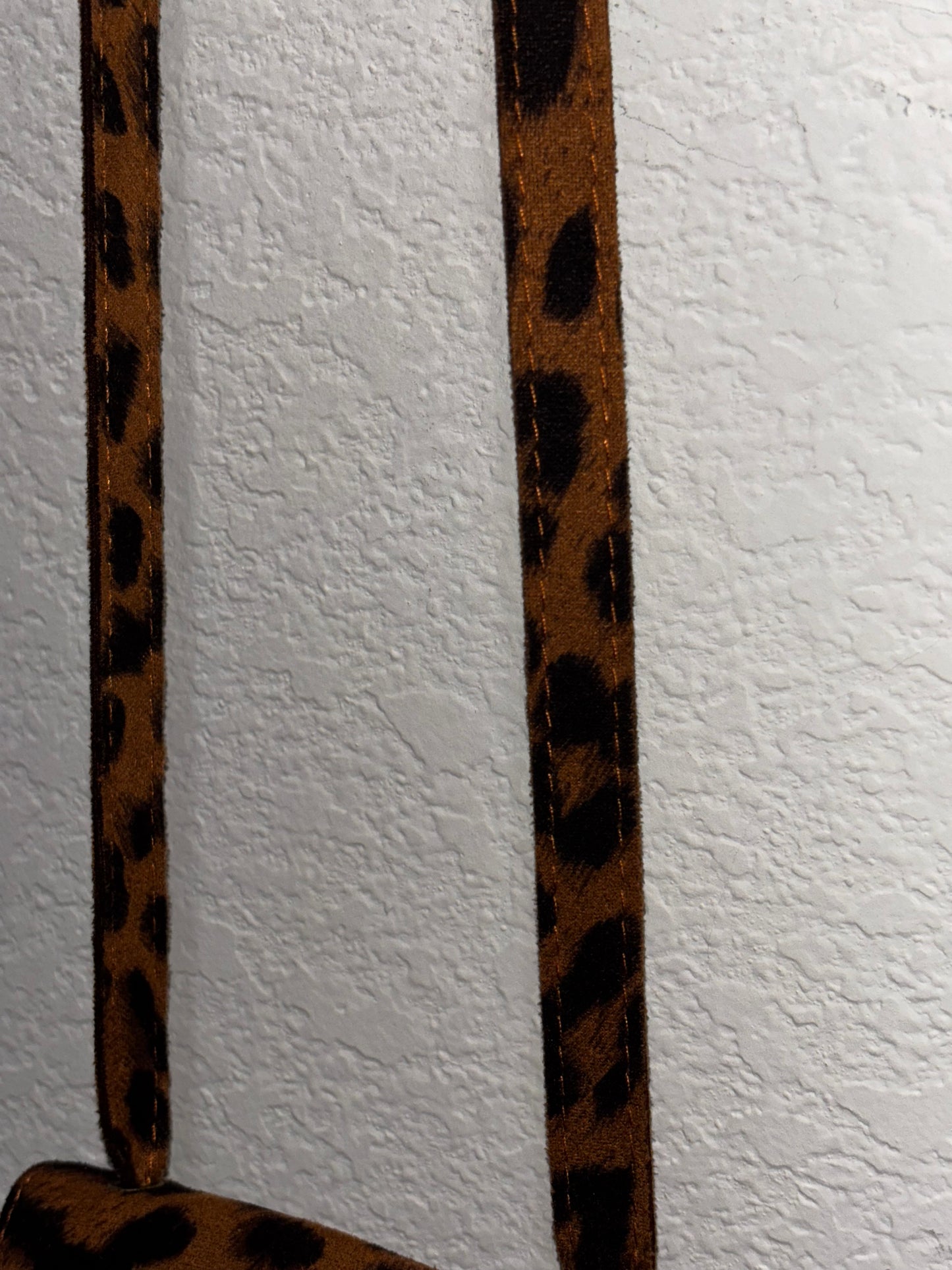 Women’s leopard fringe mini cross bag