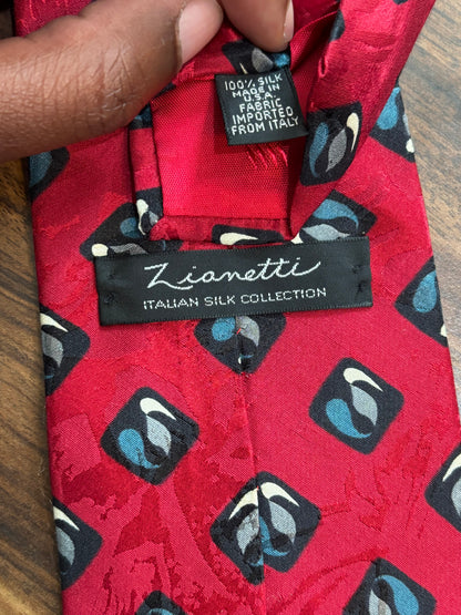 Lionetti Red Tie w/ geometric Designs 58” 100% Silk
