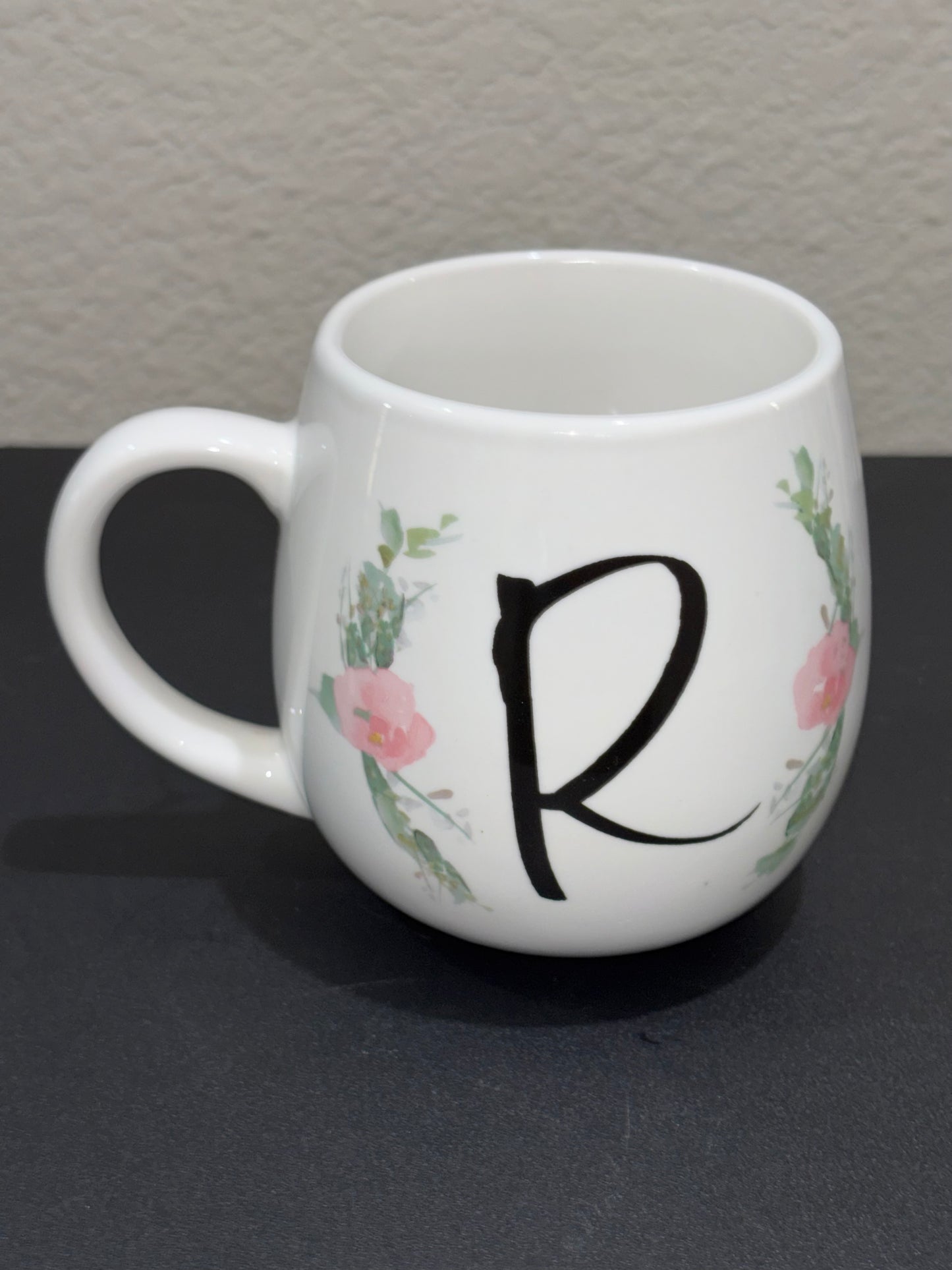 White floral pattern with letter “R” Mug