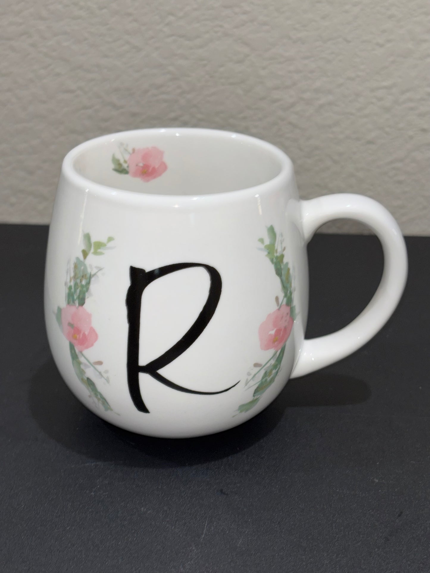 White floral pattern with letter “R” Mug
